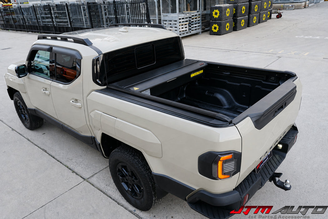 Lockable electric roller shutter with Kia Tasman tailgate integration