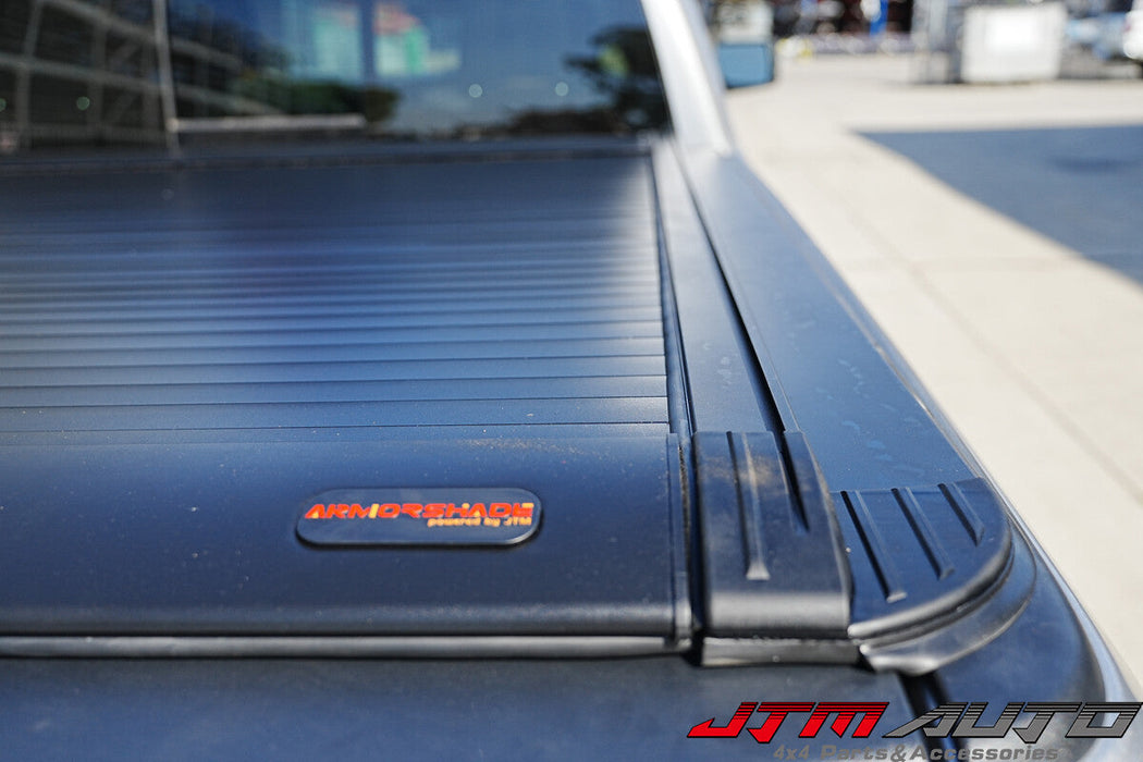 Weather-resistant Tundra bed cover with four drainage outlets